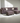 Dark Brown Sectional Sofa with Right Facing Chaise, Ottoman, and 2 Pillows