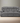 Higgins Pillow Top Arm Upholstered Motion Sofa Grey