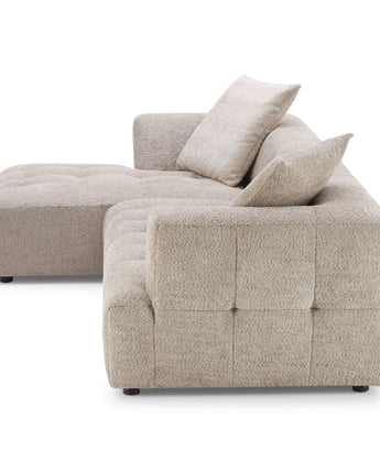 Kaynes Curved boucle sectional sofa in cozy ivory fabric.