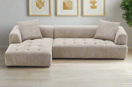 Kaynes Modern boucle sectional with soft, textured upholstery.