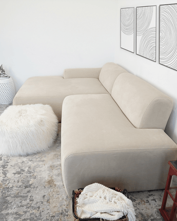 Close-up of the Mar Left Sectional Sofa in Cream, showcasing its soft upholstery.