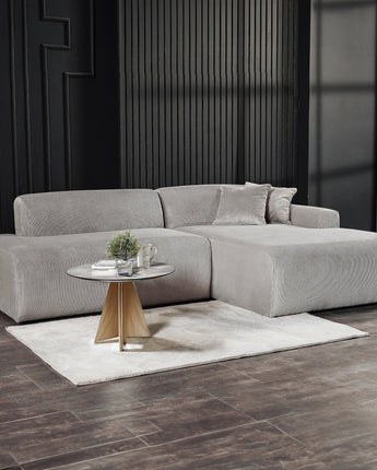 Elegant grey sectional sofa with right-facing chaise by Cherie Furniture.