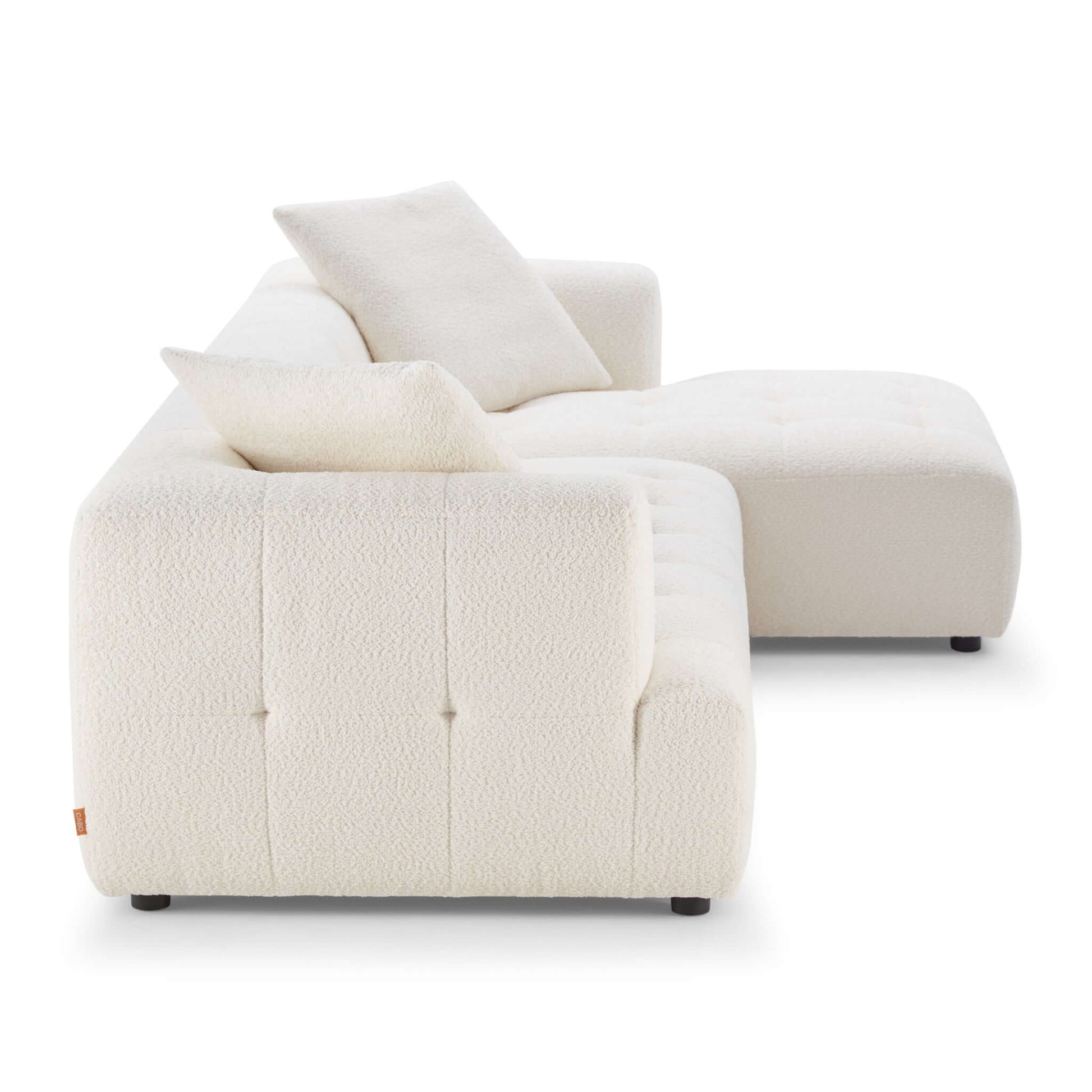 Comfortable boucle sectional with deep seating and rounded edges.