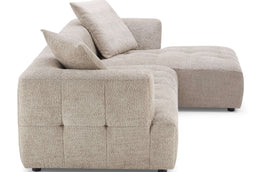 Sleek boucle sectional perfect for a mid-century modern living room.