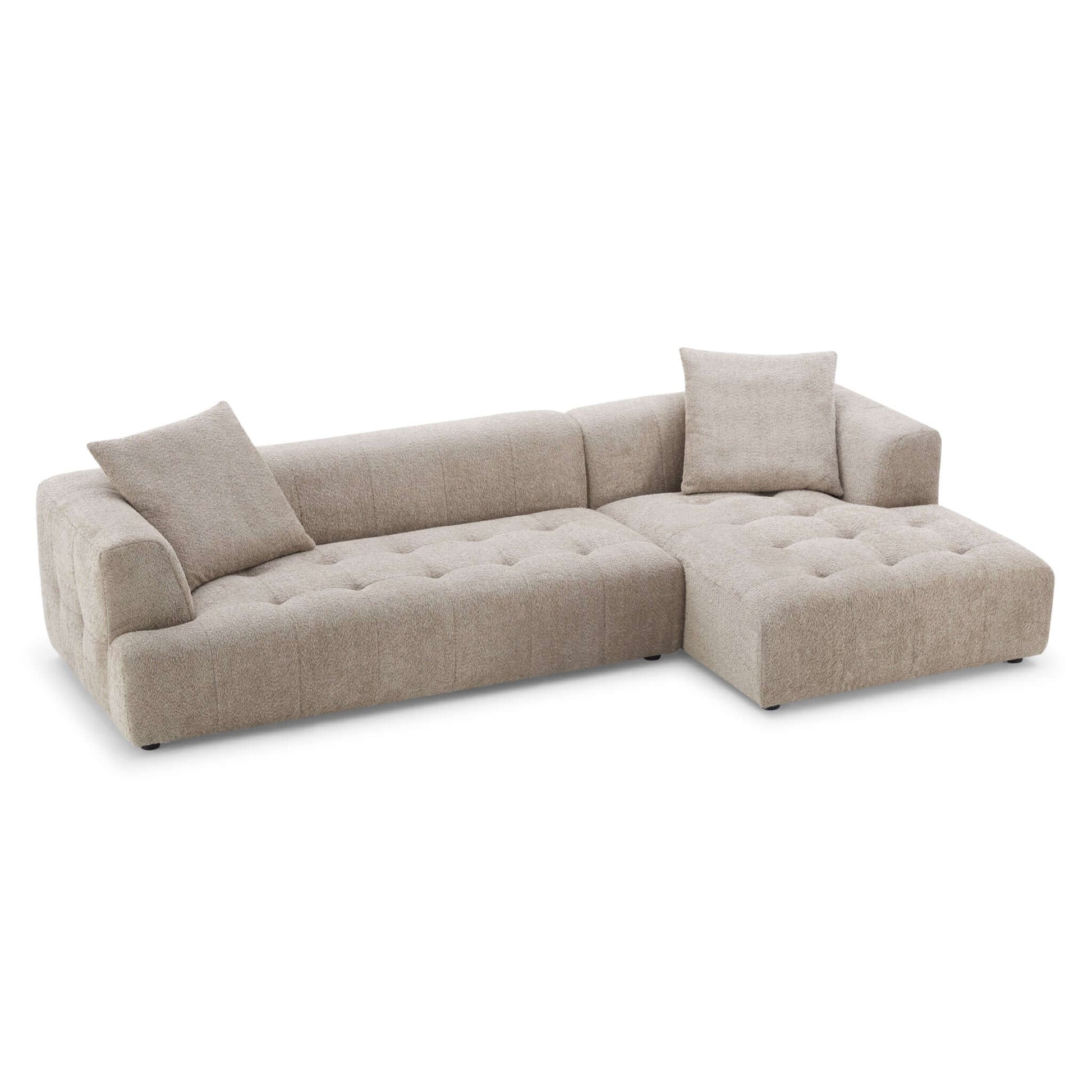 L-shaped boucle sectional with stylish, textured fabric.