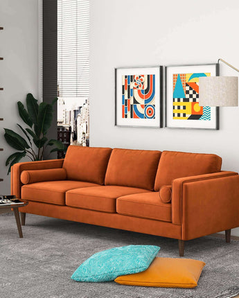 Amber Burnt Orange Velvet Sofa with sleek, mid-century design." "Luxurious Amber Burnt Orange Velvet Sofa in a modern living room." "Plush velvet upholstery on the Amber Burnt Orange Sofa." "Elegant Amber Burnt Orange Velvet Sofa with tapered wooden legs." "Cozy seating on the Amber Burnt Orange Velvet Sofa in rich orange tones." "Amber Burnt Orange Velvet Sofa with stylish button-tufted backrest." "Warm and vibrant Amber Burnt Orange Velvet Sofa centerpiece." "Amber Burnt Orange Velvet Sofa offering a bold